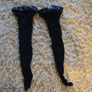 Elegant Black Women's Fishnet Stockings With Black Vegan Thigh Band.